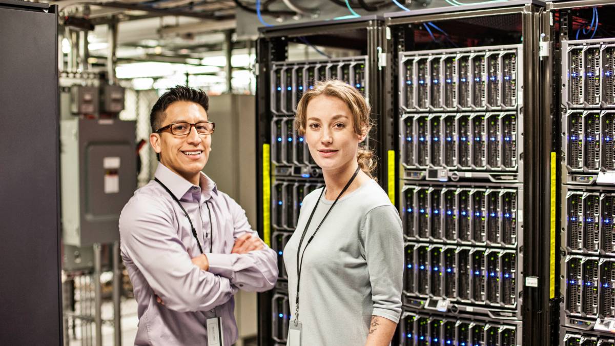 Man and woman in data center